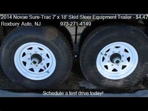 sure trac skid steer trailer|sure trac novae.